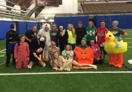 Delaware Softball Team Collects Food Donations on Halloween