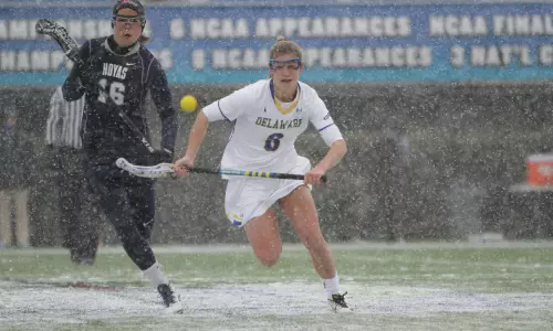 Blue Hens Stun #16 Georgetown 17-5 in Snowy Season Opener