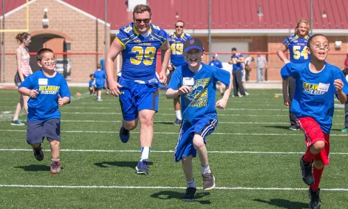 Delaware Athletics Celebrates Another Successful Downstate Day at Smyrna High School