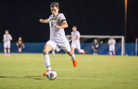 Delgado Claims Goals Record; No. 1 Terps Outlast Hens, 3-2, in Double OT