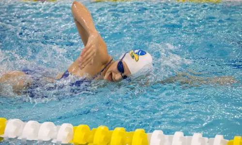 Delaware Swimmers Post Three Top Five Finishes, Set School Record at Day 1 of CAA Championships