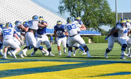 Delaware Football Battles Heat, Sees Improvement on Both Sides of the Ball in First Scrimmage