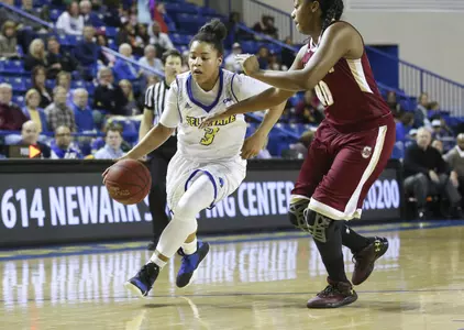 Brown and Enabosi Guide UD to 71-66 Victory Over Charleston