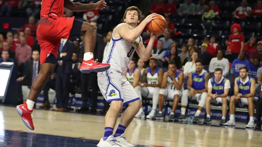 Delaware Never Trails in Impressive 76-63 Season-Opening Win at Richmond