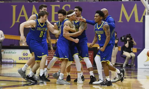 Bryant’s Three-Pointer Lifts Blue Hens Over James Madison, 58-57, in CAA Thriller