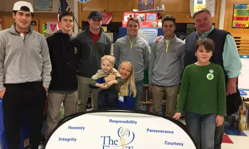 Blue Hen Golf Team Members Volunteer at First Tee of Delaware Event