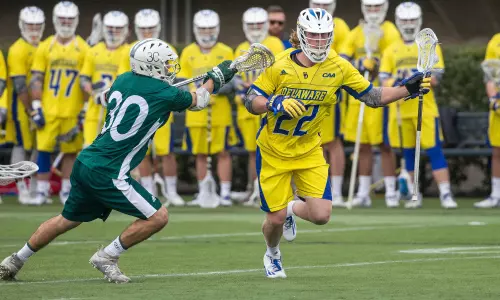 Balanced Blue Hens Upend Manhattan 12-9 to Post Fourth Straight Victory
