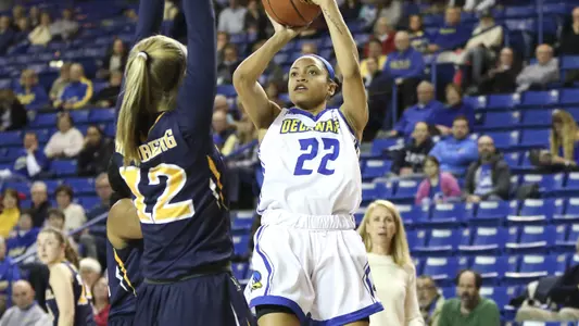 Hens Falter in 72-53 Affair to Dragons