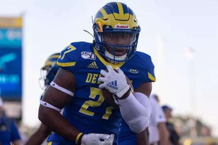 Noah Robinson in possession of ball