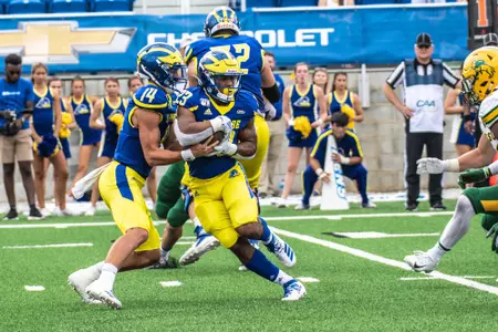 Quincy Watson hand off