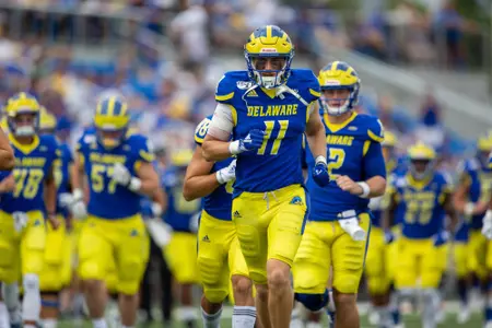 Dillon Zimmerman running onto field