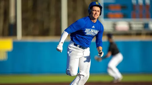 Hutchins rounds third