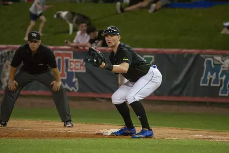 Carpenter holds the runner on