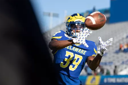 Holloway Davis warms up