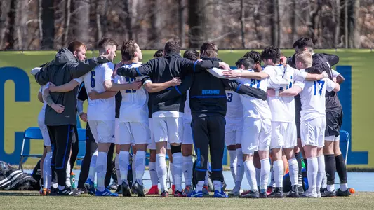msoccer21-huddle-nu