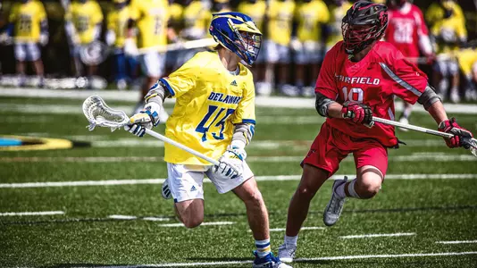 Cam Acchione drives past a Fairfield defender