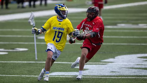 Mike Robinson looks to run past a Fairfield defender