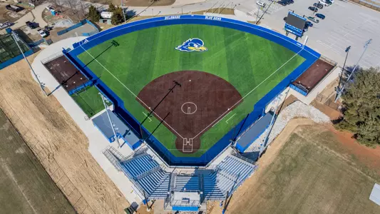 Drone aerial images of the "phase 1" renovations and additions to the UD Blue Hens Softball Team’s stadium featuring a new field, scoreboard, bullpen, and expanded seating.
