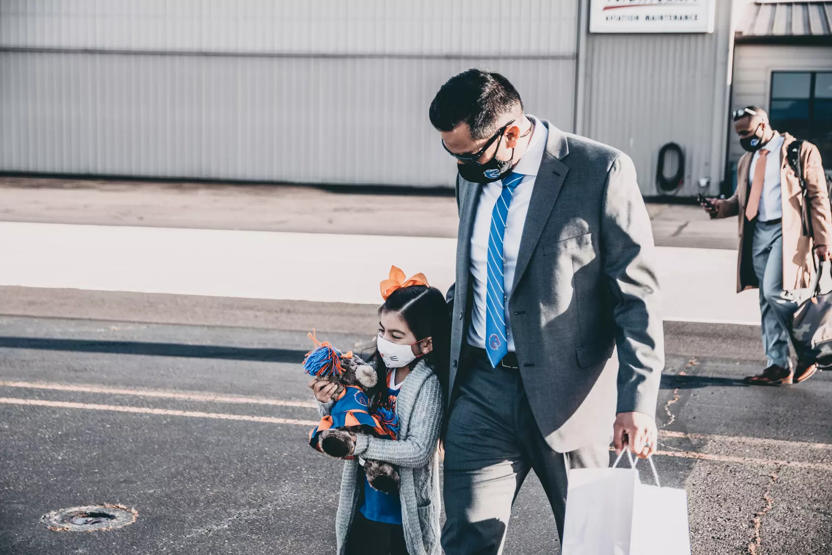 Coach Andy Avalos and family arriving in Boise