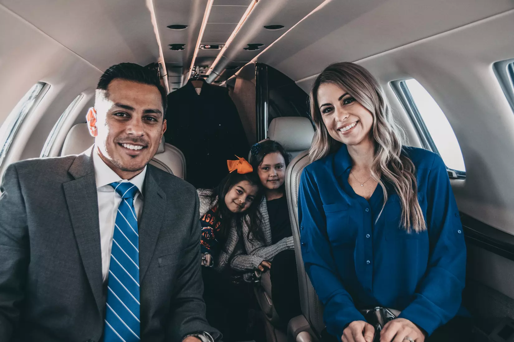Coach Andy Avalos and family arriving in Boise