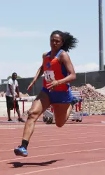 Mackenzie Flannigan broke a 19-year old school record in the 100-meter dash Friday