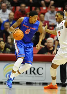 Forward Ryan Watkins works against Aztec defense in the first half.
