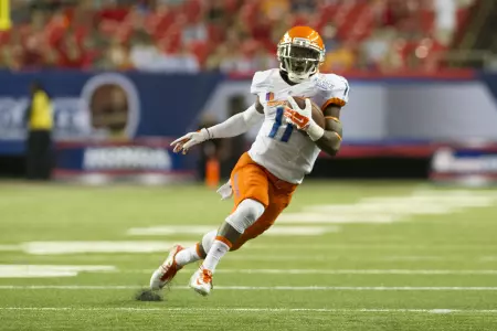 Shane Williams-Rhodes (11) dashes across the field in the Chick-fil-A Kickoff Game vs. Ole Miss.