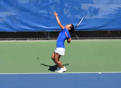 Bobbi Oshiro won both her doubles and singles matches.