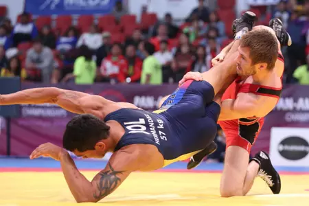 Andrew Hochstrasser won a gold medal at 61 kilograms.