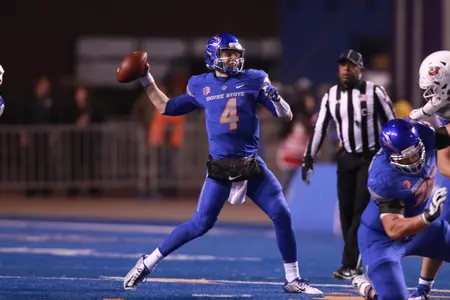 Dec 2, 2017; Boise, ID, USA; Boise State Broncos quarterback Brett Rypien (4) throws a pass down field during the first half of the Mountain West championship game against Fresno State Bulldogs at Albertsons Stadium. Mandatory Credit: Brian Losness-USA TODAY Sport