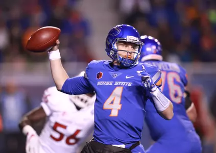 Dec 2, 2017; Boise, ID, USA; Boise State Broncos quarterback Brett Rypien (4) throws a pass downfield during the first half of the Mountain West championship game against Fresno State Bulldogs at Albertsons Stadium. Mandatory Credit: Brian Losness-USA TODAY Sport