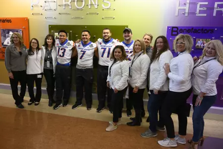 Broncos Visit Opportunity Village