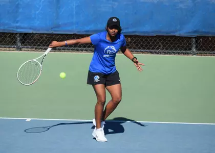 Bhakti Shah returns the ball.