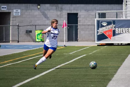 Boise State soccer player Kenzie MacMillan chases down the ball.
