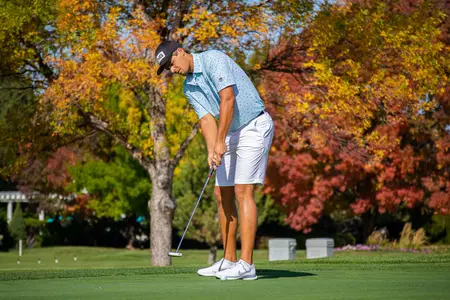 Hugo Townsend on a putt.