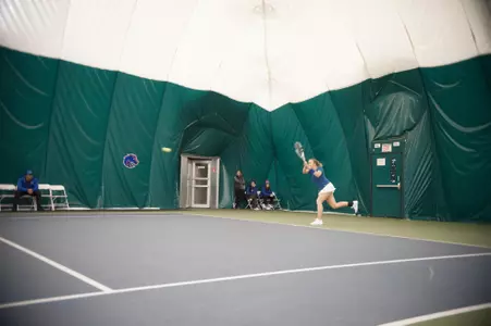 Anja Dokic returns the ball.