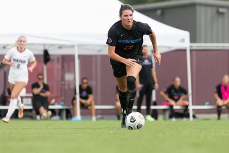 Boise State soccer player Macie Nelson looks for a teammate to pass to.