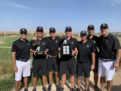 The Broncos pose as the Mark Simpson Invitational champions.