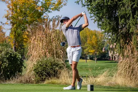 Max Charles tees off.