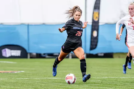 Boise State soccer player Morgan Miles takes a shot.