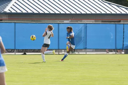 2014 Boise State soccer player Mikhaila Bowden plays a long ball.