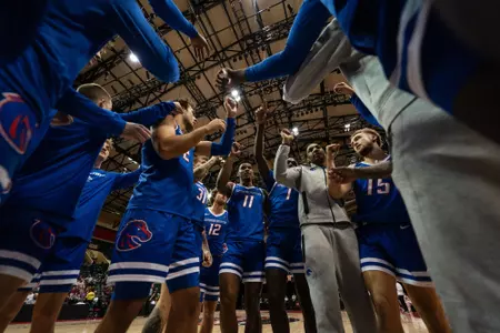Team huddle photo from game against Virginia Tech.