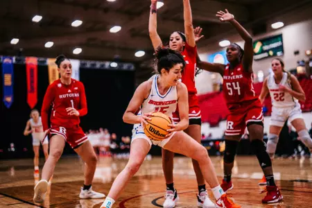 Alyssa Christensen power dribbles against Rutgers