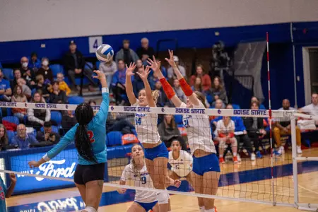 Paige Bartsch and Annie Kaminski go up for a block against New Mexico on Nov. 2, 2023.