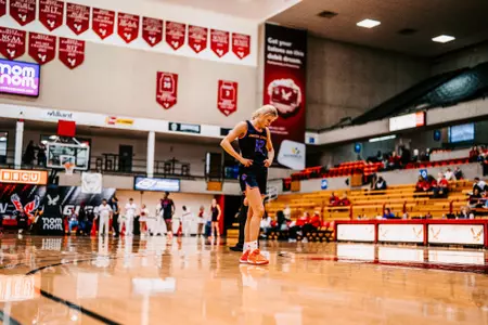Mary Kay Naro looking down at the court.