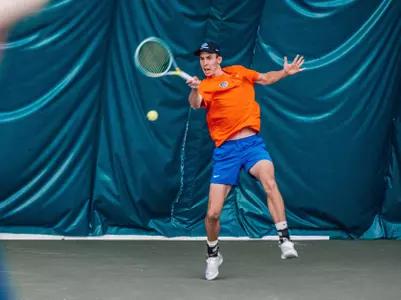 A photo of Sam Sippel hitting the ball during the Broncos win versus Idaho, 2-10-2023