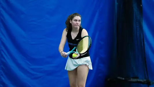 Ryan Kershner prepares to serve against College of Idaho, Feb. 10, 2023.