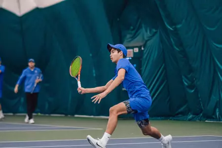 James Van Herzeele returns a volley against Idaho State on Jan. 28, 2023.