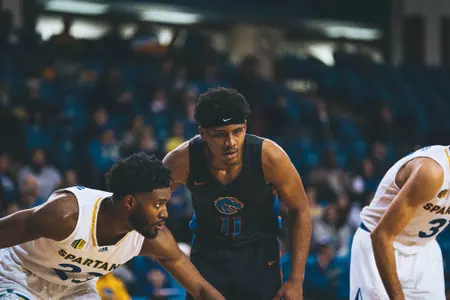 Chibuzo Agbo waits on the lane line for a free throw in a game at San Jose State.
