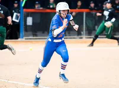 Abby Bumcrot runs to first base after a hit against Portland State, Saturday, March 11.